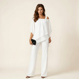https://cdn.shopify.com/s/files/1/0976/6243/5712/files/Woman_in_white_standing_studio_202605090915.jpg?v=1778311022