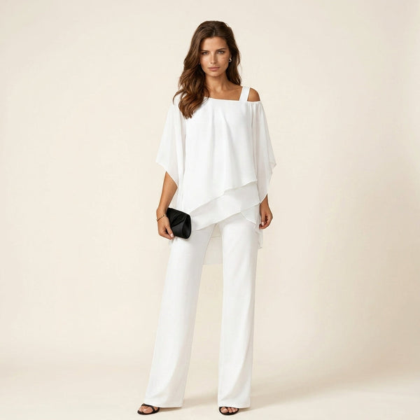 https://cdn.shopify.com/s/files/1/0976/6243/5712/files/Woman_in_white_standing_studio_202605090915.jpg?v=1778311022