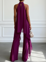 https://cdn.shopify.com/s/files/1/1006/7876/2827/files/WomenPurpleAsymmetricHalterSleevelessElegantTopWithPantsTwo-PieceSet.png?v=1776287991